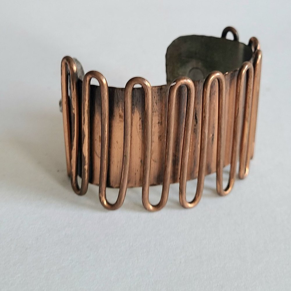 Copper swirl design cuff bracelet.